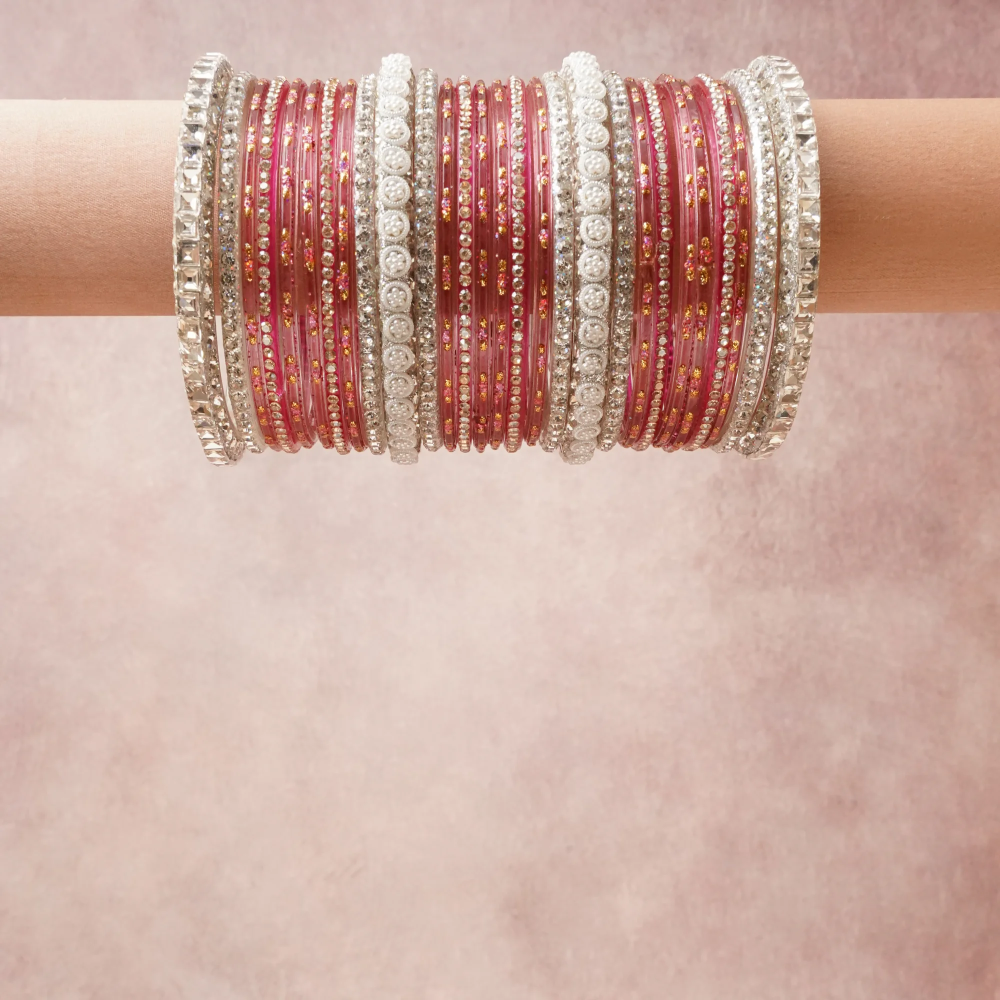 A grounding Crimson forms the heart of the set, while touches of  add charm.

A thoughtful composition of Lacquered Glass, Silver-toned Metal Alloy, Crystal, designed to feel complete without being heavy.
Each element layers seamlessly, creating a look that is refined, wearable and quietly striking.